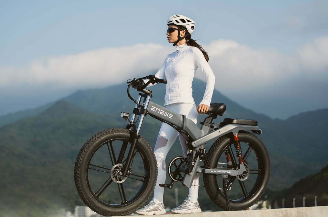 A girl with her Electric bycycle 